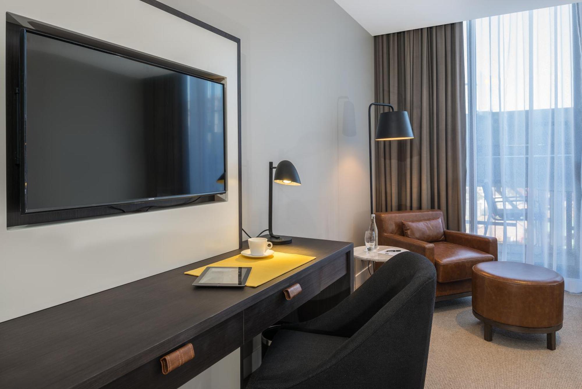 Peppers Docklands Hotell Melbourne Exteriör bild A room at the hotel